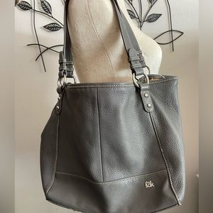 The Sak Grey purse with silver hardware.
